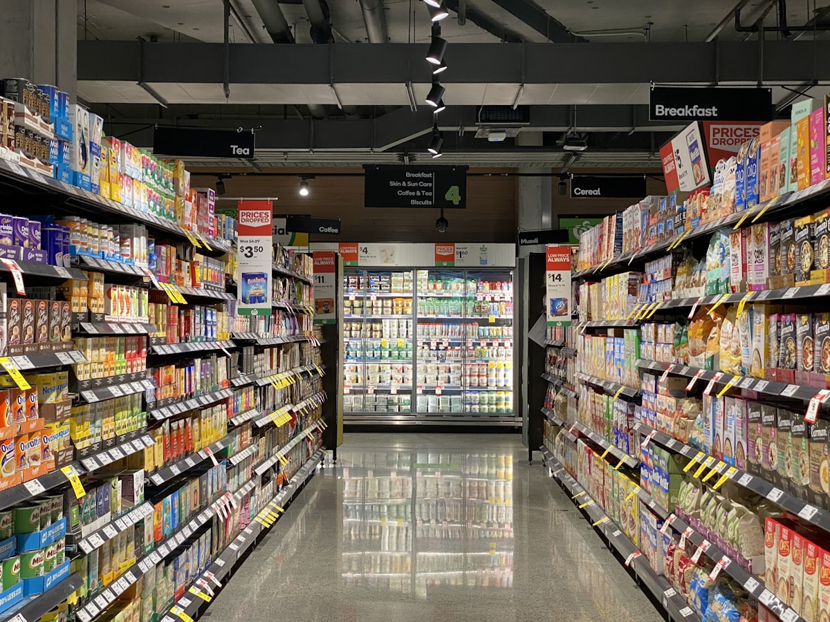 Daily Needs Store interior showing clothing racks and homeware shelves